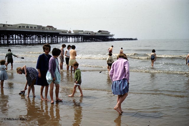 This scene still resonantes today - a paddle in the sea is a must during a visit to Blackpool