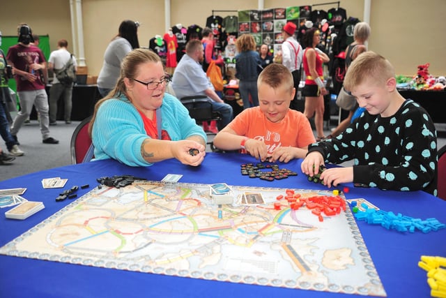 Kelly Henley, Adam Henley, 8 and Jason Henley, 11,  play Cobra Paw at Blackpool Comic Con