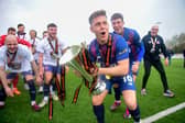 ​Top scorer Nick Haughton leads the title celebrations for AFC Fylde at Bradford  Picture: STEVE MCLELLAN