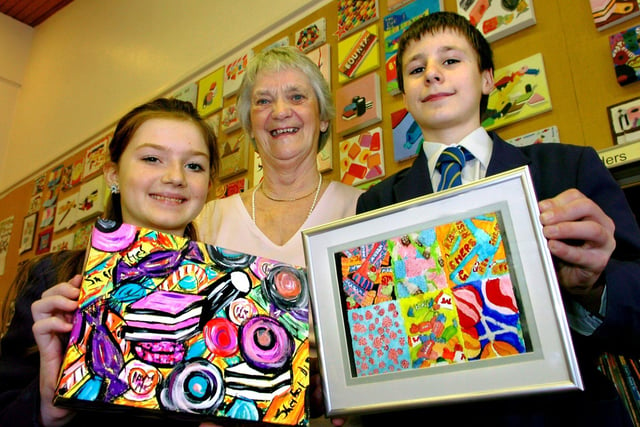 Poulton Art Club secretary Audrey Dewhurst with Hodgson students Olivia Matthews (11) and Oliver Stock (14) and their artwork exhibited at The Sweets Art Exhibition in 2007