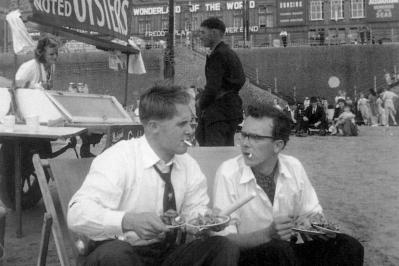 Eric Morecambe and Ernie Wise on the beach at Blackpool in 1953