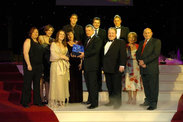 Tower General Manager Geoff Sage presents staff from the De Vere Hotel the award for Large Hotel of the Year, 2006
