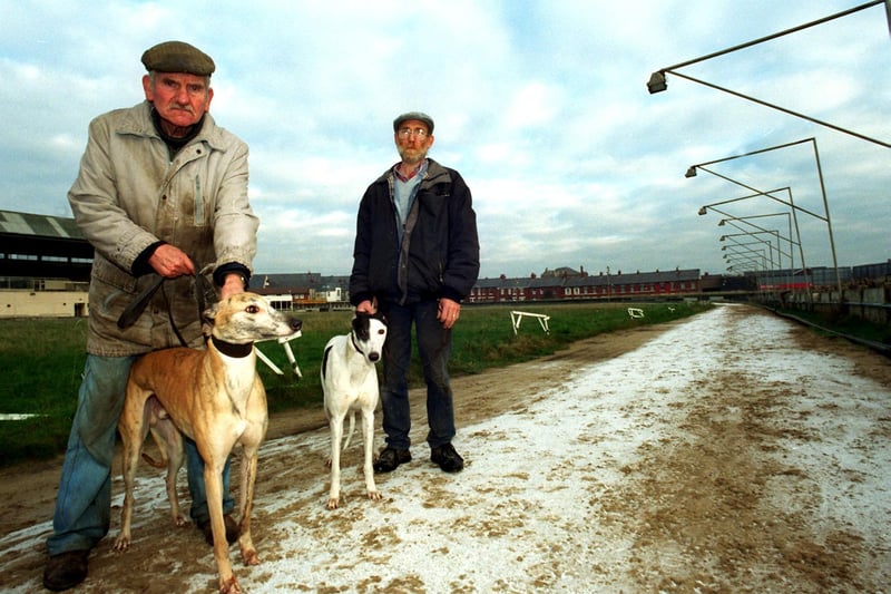 Greyhound racers Jim Crawford with Saluki and Tom Frain with Sycamore Girl look around the closed Blackpool Greyhound Stadium in the late 90s