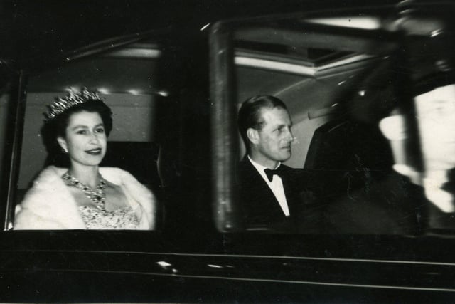 The Queen and the Duke of Edinburgh on their way to the Royal Command Performance in 1955.
The photo was taken on Talbot Road as the car travelled from Poulton Station.
