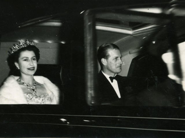 The Queen and the Duke of Edinburgh on their way to the Royal Command Performance in 1955.
The photo was taken on Talbot Road as the car travelled from Poulton Station.
