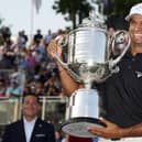 Aaron Rai celebrates with the Wanamaker Trophy after winning the PGA Championship at Aronimink Golf Club in Newtown, Pennsylvania