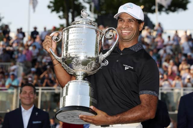 Aaron Rai celebrates with the Wanamaker Trophy after winning the PGA Championship at Aronimink Golf Club in Newtown, Pennsylvania