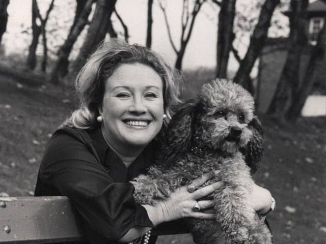 Elizabeth Larner, pictured by Gazette photographer Peter Emmett, in 1976, with her pet poodle Nipper, in Ashton Gardens, St Annes