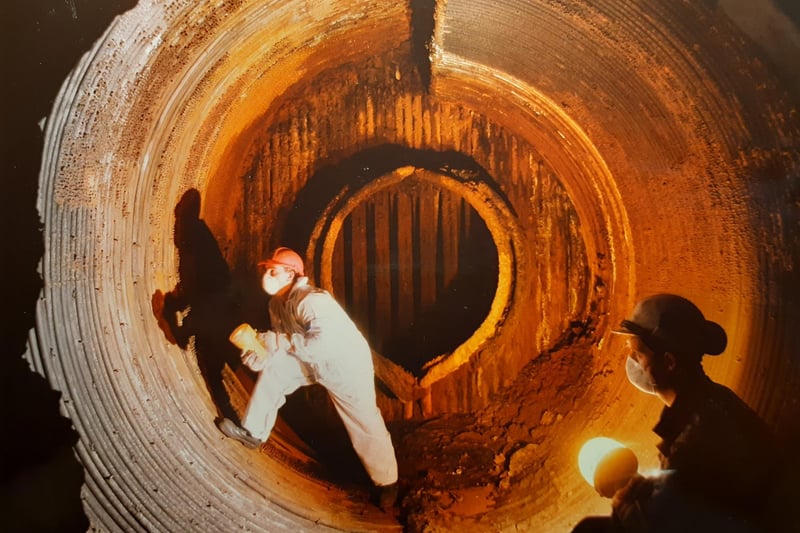Fitters Ron Jones and Darre Fare (left) inside one of the three giant boilers at the ICI power statiion in 1992
