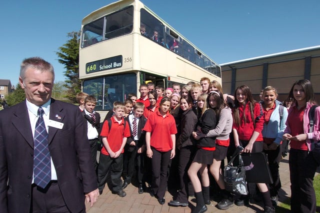 Millfield High School head teacher Alan Harvey and pupils with the 660 school bus service which faced the axe in 2006