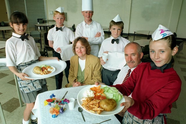 Grange Park Primary School Barry Wood and  Alison Gilchrist being waited on by 'Dinmore Diner staff' Stacey Sutherland, Richard Whalley, Daniel Grant, Christopher Vandalli and Sara Woodman, 1997