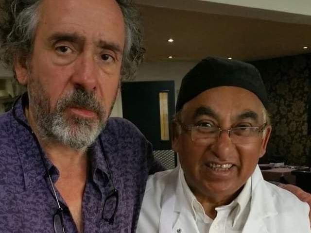 Film director Tim Burton at the Bilash Restaurant in St Annes with proprietor Azizul Choudhury, 2015. He was in town for the filming of his movie Miss Peregrine's Home for Peculiar Children