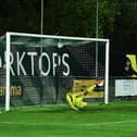 Nick Haughton scores his and Fylde's second goal from the penalty spot in Tuesday's FA Cup replay win at Farsley Celtic  Picture: STEVE MCLELLAN