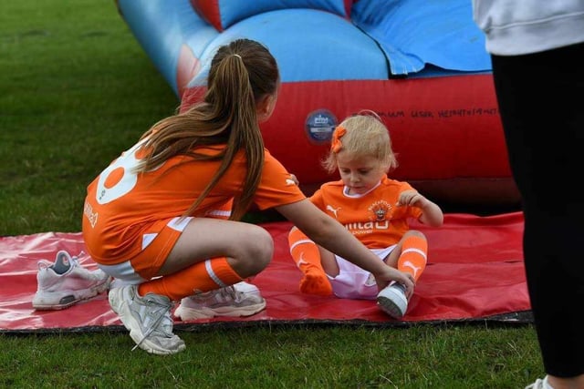 Verity and sister Felicity enjoy the bouncy slide