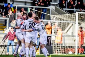 AFC Fylde celebrate Sam Osborne's late winner against Hereford  Picture: STEVE MCLELLAN