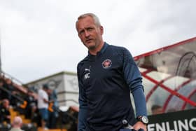 Experienced coach Neil Critchley takes on a relative new comer to football management. John Mousinho's Portsmouth are top of the league. (Photographer Alex Dodd/CameraSport)