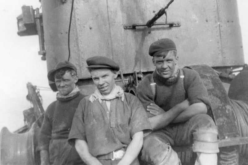 Pictured on board an unnamed trawler are Tom Rogerson of Fleetwood on the left and Lenny Rogerson on the right. Joe Rogerson in the centre