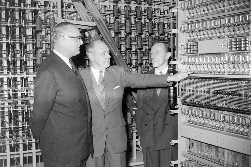 Mr J C E Postance (centre) the executive engineer, explains the working of the new Marton automatic telephone exchange, on Preston Old Road, to Sir Roland Robinson MP for Blackpool South. On the right is Mr J D Ball (technical officer), 1959