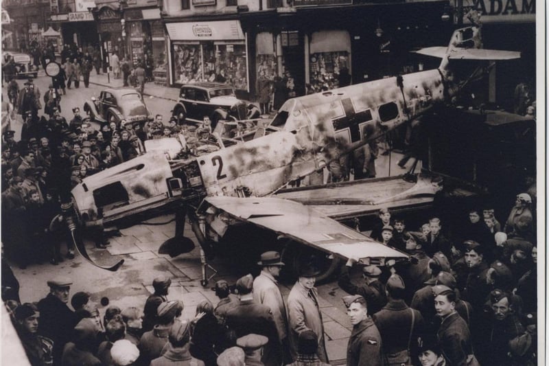 This German Messerschmitt, shot down by a World War Two British fighter plane, arrived in Church Street Blackpool . It was on it's way to the old St John's Market site to raise money for the Spitfire Fund