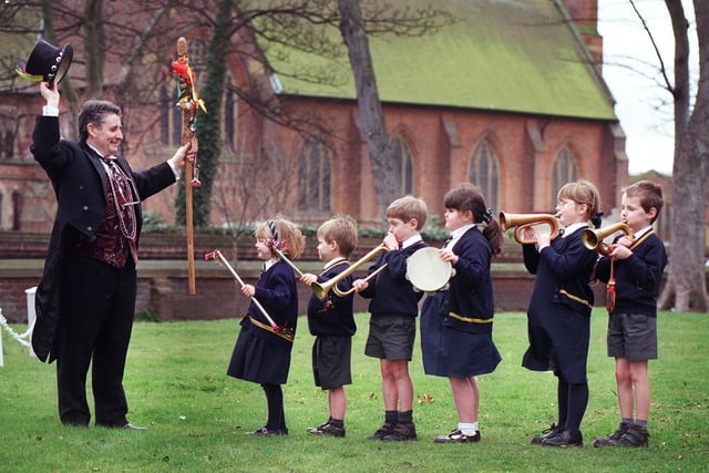 Heyhouses pupils Hannah Hyde, Christopher Blackburn, Lawrence Vincent, Alice O'Toole, Alexandra Barrow, Joshua Flannery pictured with "Spellbinder" Bill Gillespie as part of the schools Music Arts and Drama week, 2000