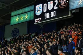 Seasiders supporters made the trip to the John Smith's Stadium.