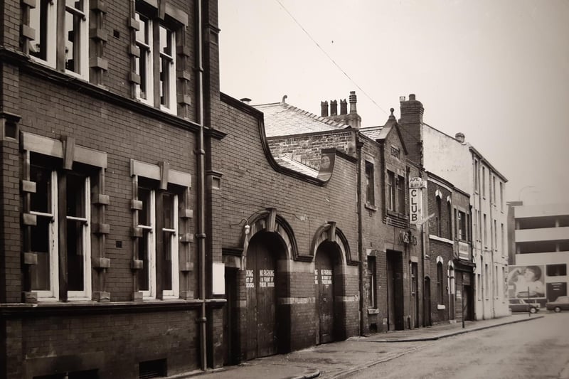 This photo snaps the east side of Water Street. What were the buildings used for?