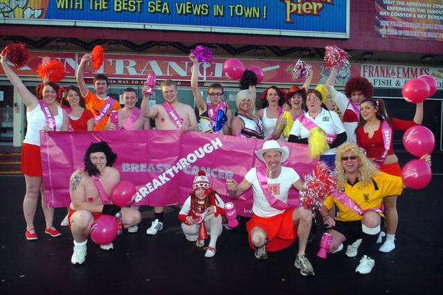 Hardy Blackpool fundraisers walked from South to North Pier and back on Boxing Day, dressed as cheerleaders and footballers, to raise money for the Breakthrough Cancer charity