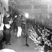 The bad boys of Rock and Roll ran into a storm at the Empress ballroom in 1964. Minutes after this picture was taken, fans invaded the stage