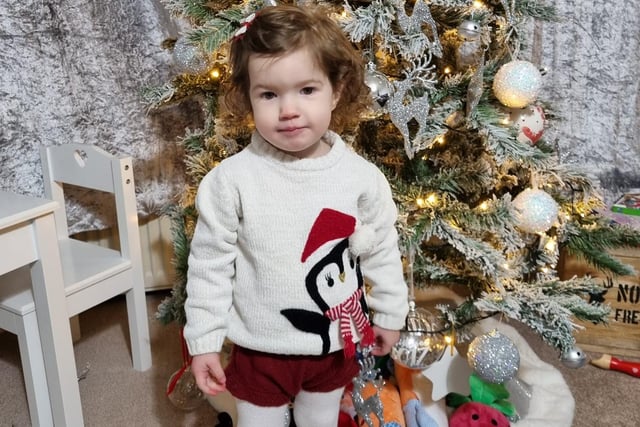We love the penguin on two-year-old Heidi's jumper.