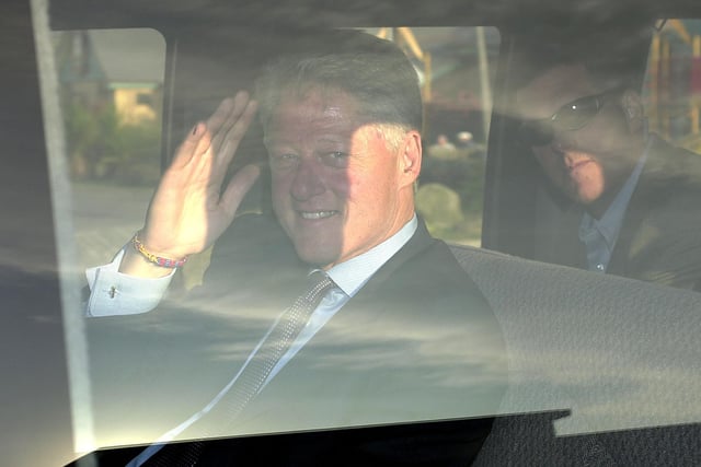 Bill Clinton leaves Blackpool airport after arriving for the Labour Party Conference in October 2002