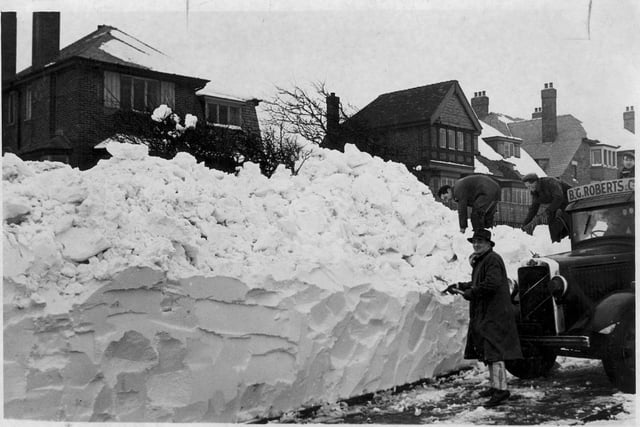 Digging out on Newton Drive  on February 2 1940. Imagine seeing snowfall like that again...