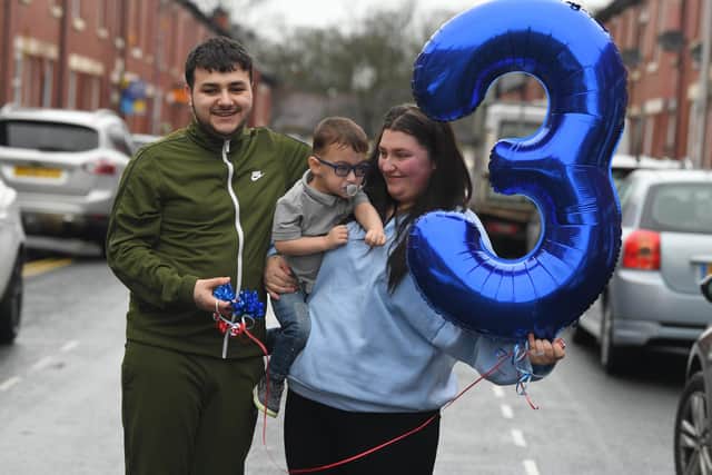 Photo Neil Cross; Jase-James McCready Rogers, celebrates his third birthday with parents, Leah and William