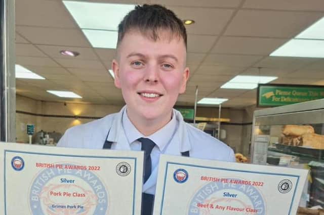 Harry Ellis with his certificates