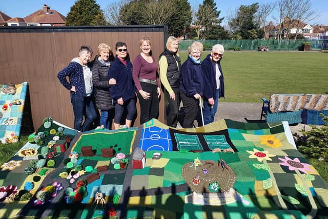 Knitters from the Friends of Highfield Park in South Shore have created this amazing knitted mural as part of their annual yarn-combing event in the park