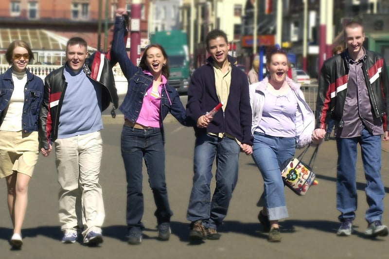 Strolling on the prom in 2002. Pictured left to right are: Georgia Taylor as Toyah, Alan Halsall as Tyrone, Samia Ghadie as Maria, Ryan Thomas as Jason, Jennie McAlpine as Fiz, and Andy Whyment as Kirk