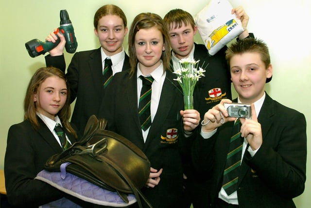 St Georges CE High School pupils illustrate the business related courses on offer at their school. From left, Helen Cummings, Bethan Wylie, Jessica Holker, Jake Emery and Stephen Hawkins