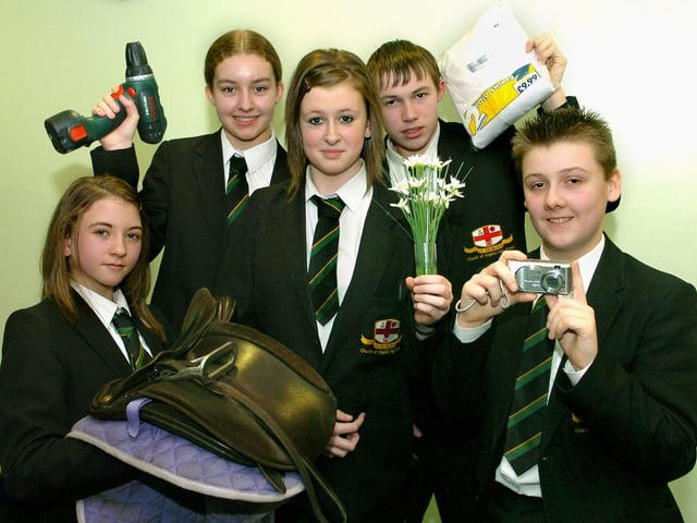 St Georges CE High School pupils illustrate the business related courses on offer at their school. From left, Helen Cummings, Bethan Wylie, Jessica Holker, Jake Emery and Stephen Hawkins