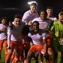 The youngsters celebrate their penalty shootout win