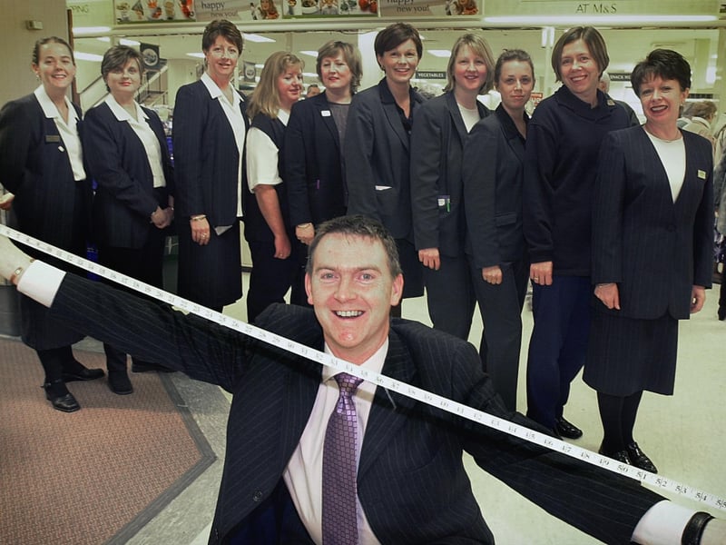 Staff were shedding the Christmas pounds by joining a 28-day slimming course run by the store. Store Manager Steve O'Brien wields the tape measure with some of the volunteers, L-R: Sarah Davies, Christine Hems, Kathy Clayton, Margaret Cox, Heather Churchman, Dianne Pryah, Vicky Carter, Tracy Wheeler and Mel Sharples