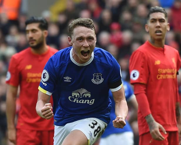 Everton's English defender Matthew Pennington celebrates after scoring their first goal during the English Premier League football match between Liverpool and Everton at Anfield in Liverpool, north west England on April 1, 2017.