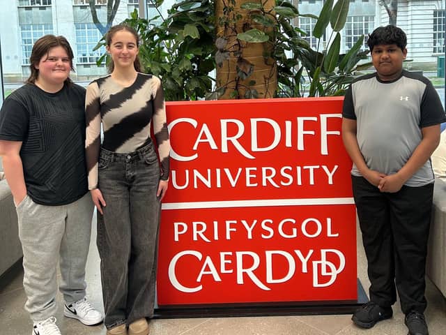 Bailey, Olivia and Shajan in the entrance to Cardiff University