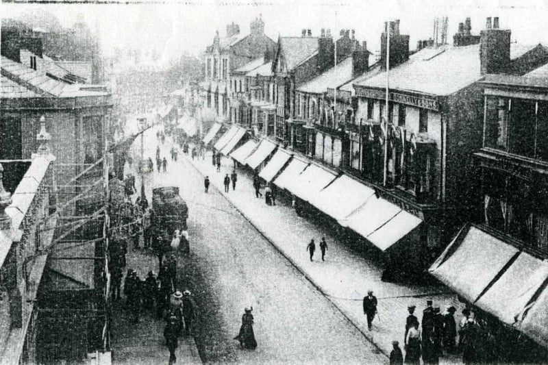 Church Street viewed from the balcony of the Winter Gardens, showing Donnelly and Son drapers and outfitters on the right. The white building to the left of the balcony is the Adelphi Hotel