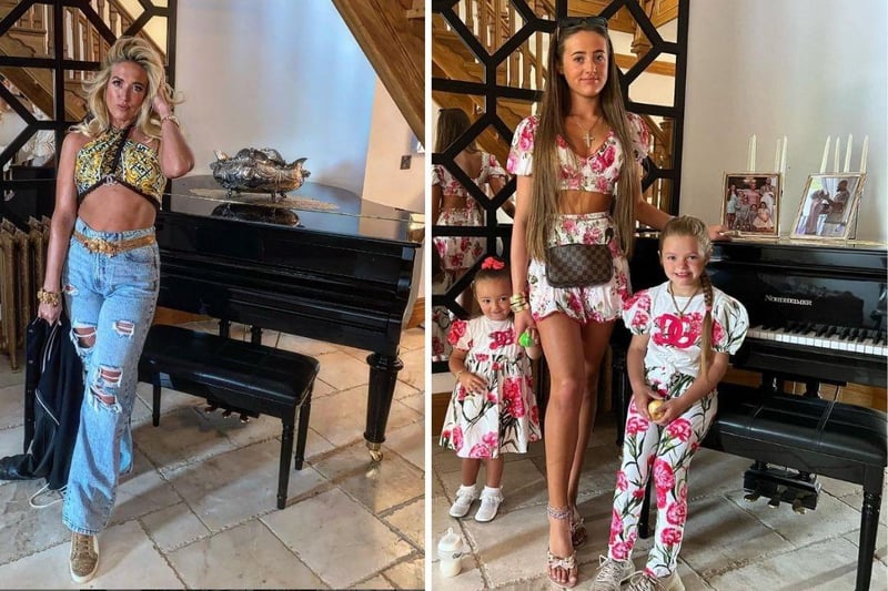 The family have a black grand piano nestled underneath a freestanding staircase