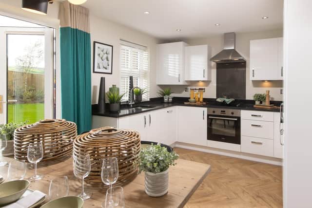 BM - 002 BM_BrunLeaHeights_Burnley_Ellerton_3bed - A kitchen and dining area in a typical home at Brun Lea Heights