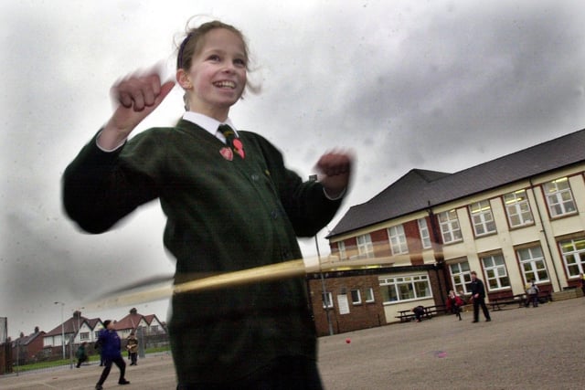 Katie Ivett goes hoopla crazy at St John Vianney School in 2000