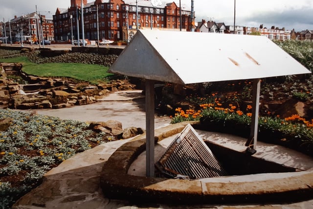 The wishing well in the gardens at Gynn Square had been vandalised in this photo from 1994