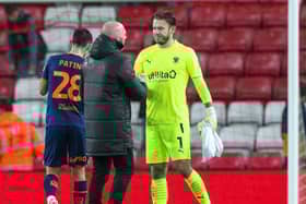 Michael Appleton shakes Chris Maxwell’s hand after the match