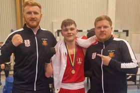Oliver Grimshaw with coaches left Chris Keeler and Alan Smith right