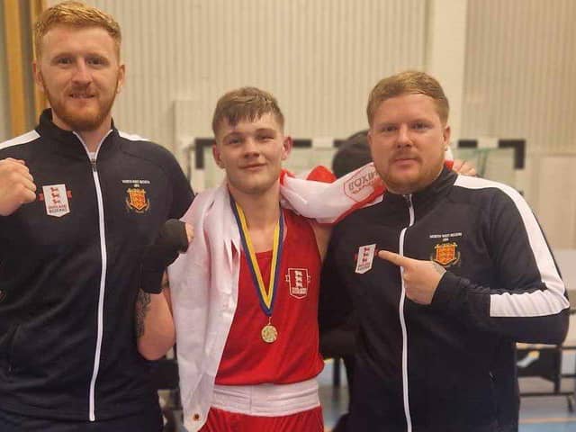 Oliver Grimshaw with coaches left Chris Keeler and Alan Smith right