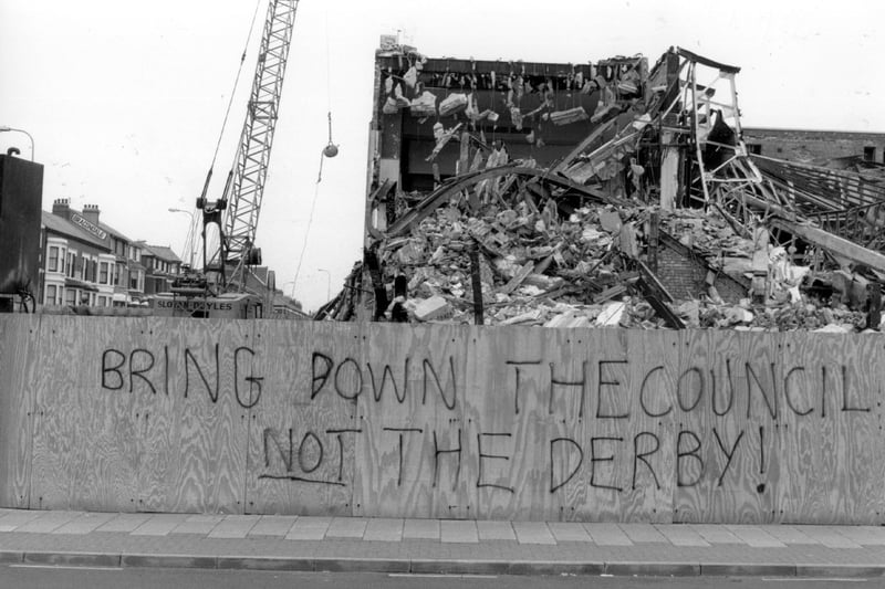 Protest on the boarding which surrounded Derby Baths after it was demolished in 1990